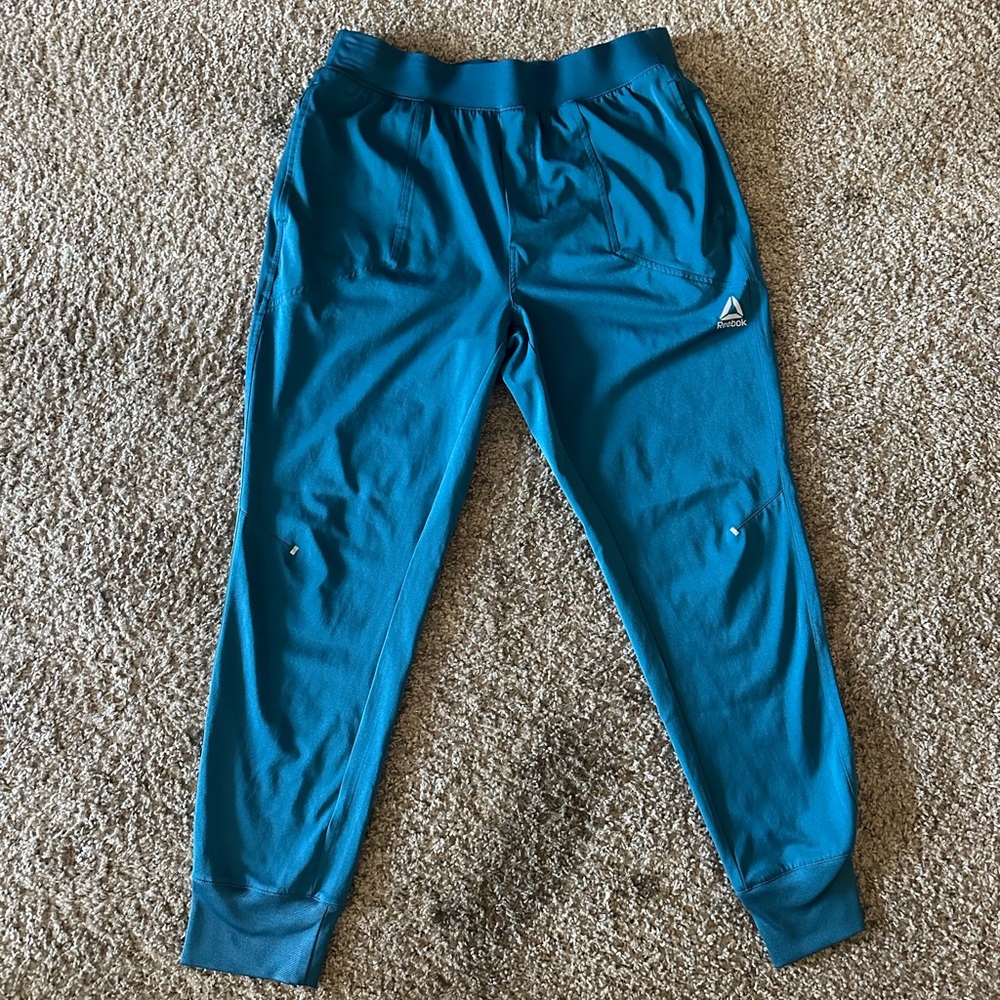 Reebok Size Large Men’s Distance Woven Jogger Pants Blue Coral
